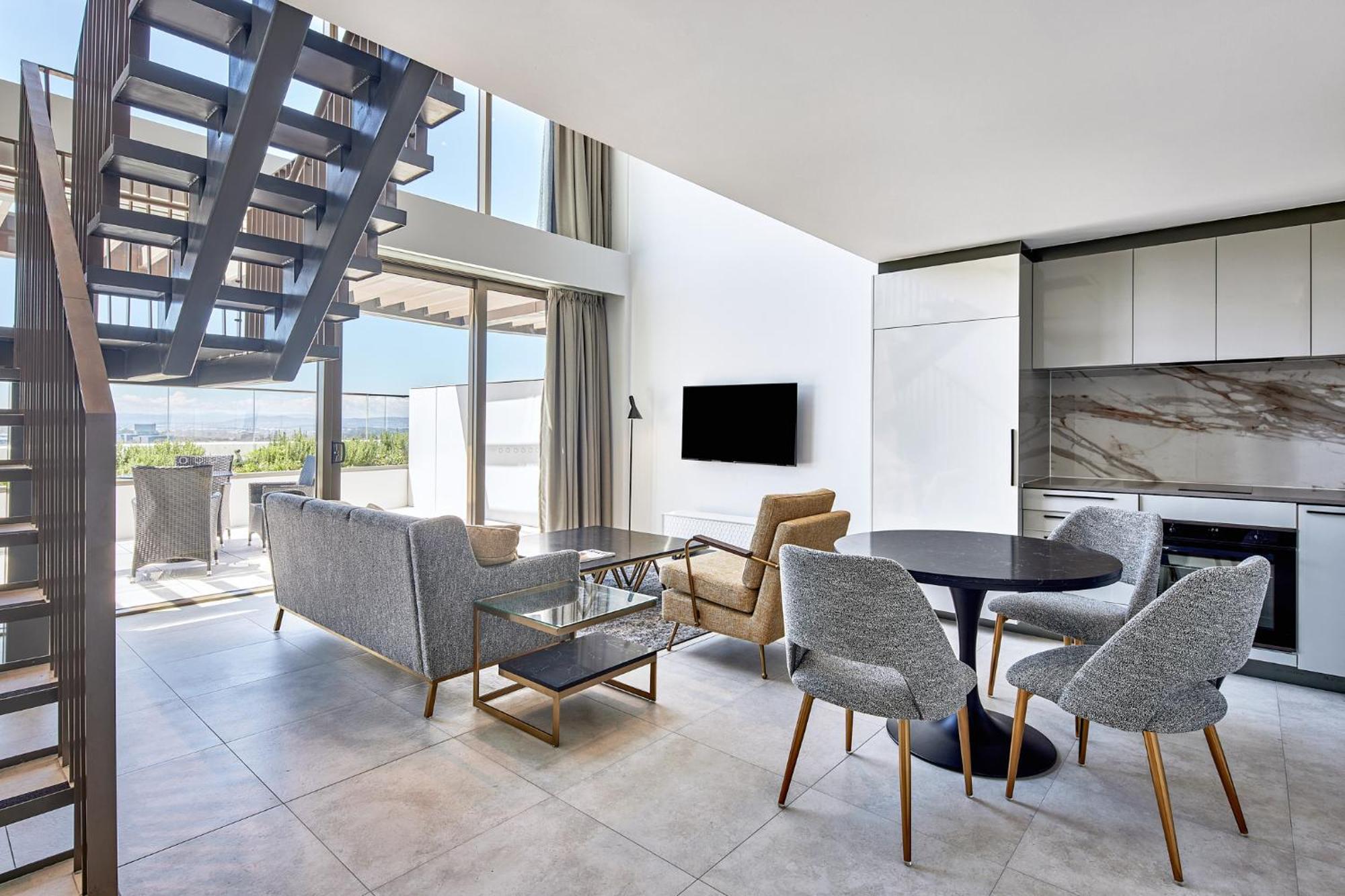 Meriton Suites Canberra Exterior photo A living room at the hotel
