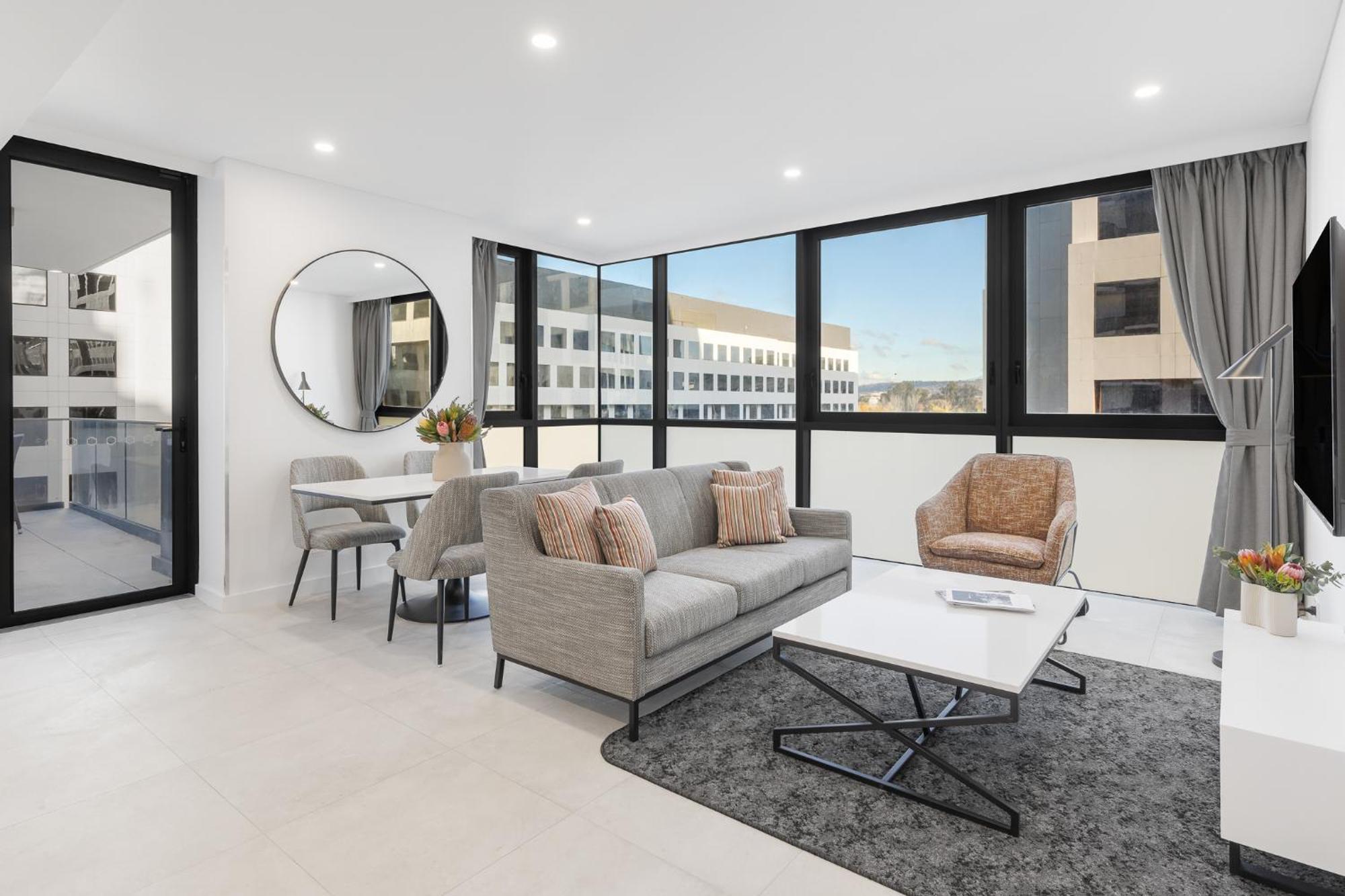 Meriton Suites Canberra Exterior photo The interior of a staged apartment